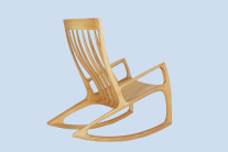 Zu sehen ist ein Schaukelstuhl aus Roteiche, aus Manufakturproduktion, feinste Handarbeit