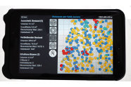 Ein Tablet mit Schutzhülle, auf dem Display sind viele gelbe, blaue und rote Punkte angezeigt